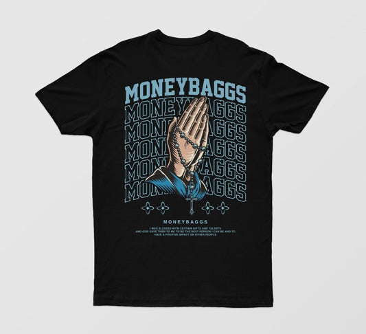 Black t-shirt with 'MONEYBAGGS' text and a logo design of praying hands on the front and back.
